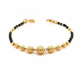22K Gold Bracelet with black beads - Round center