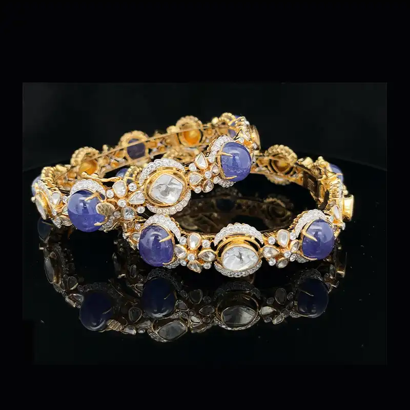 Pair of stunning bangles with uncut diamonds and gemstones