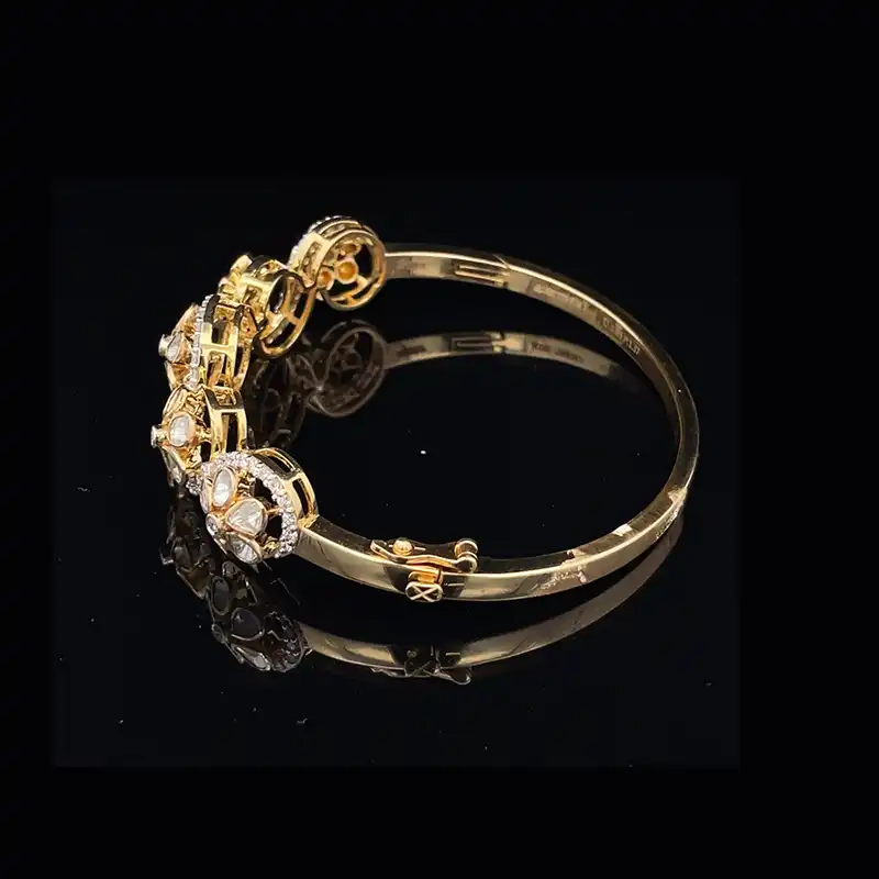 Stunning Yellow Gold bangle with uncut diamonds