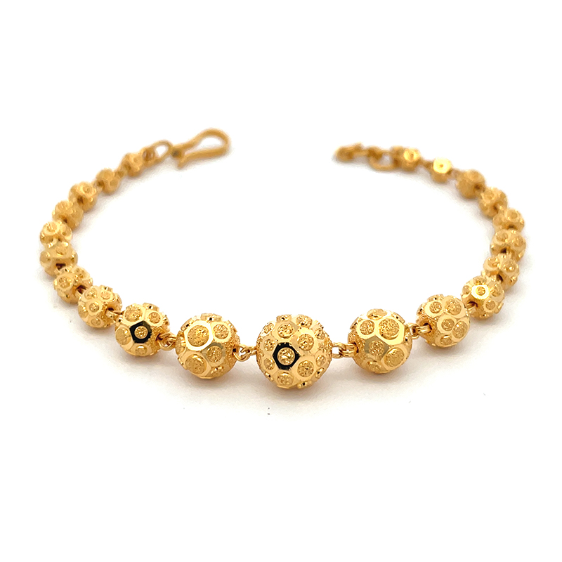 Elegant Gold Bracelet with Intricate Details  - 7 inch