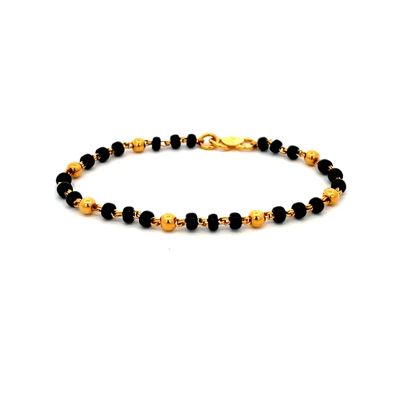 Baby bracelets with Black beads and Gold